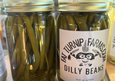 Canned dilly beans in a 16 oz jar